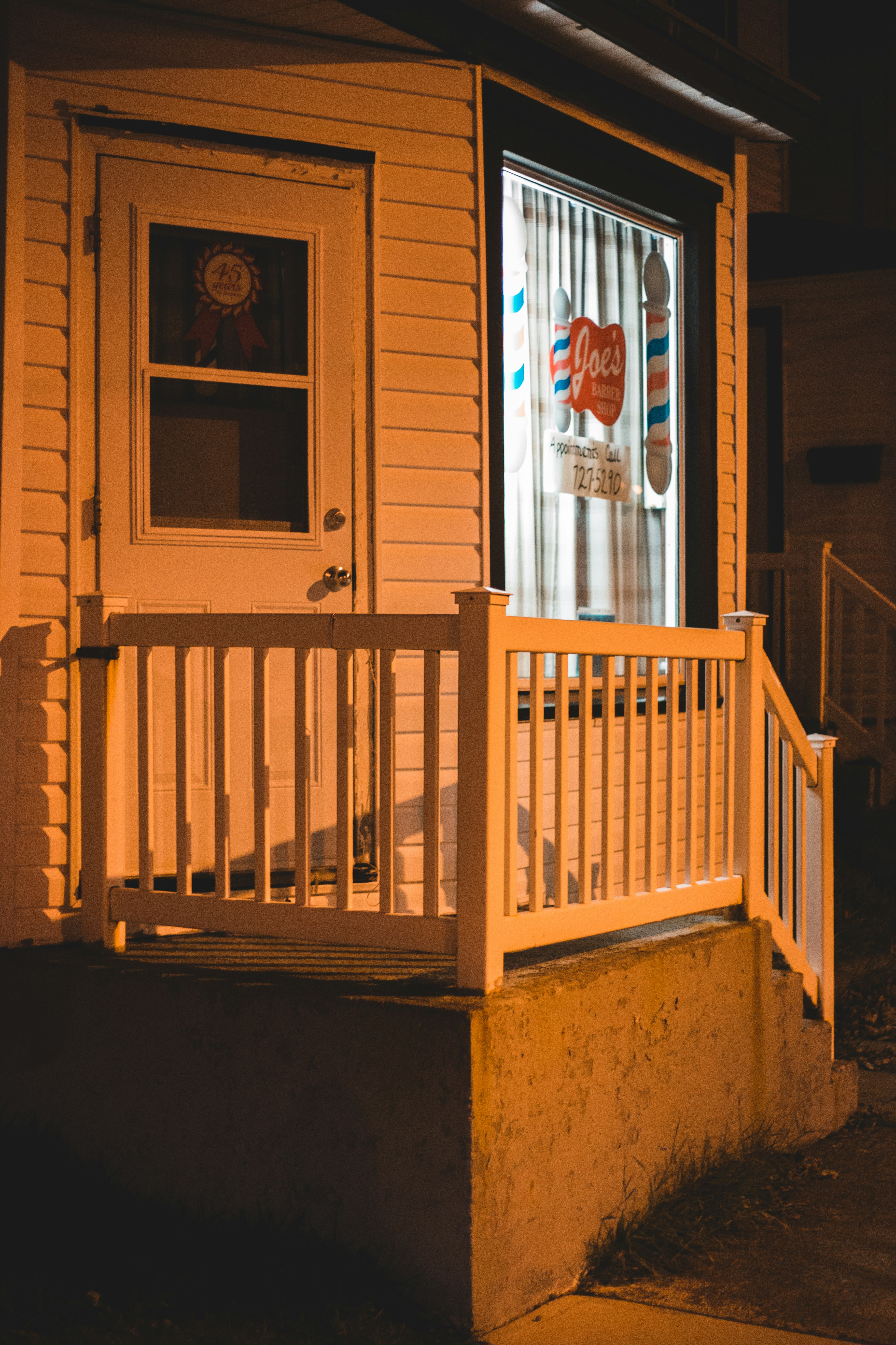 brown wooden window frame with white window blinds